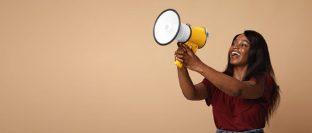 Emotional black woman with megaphone saying something loud