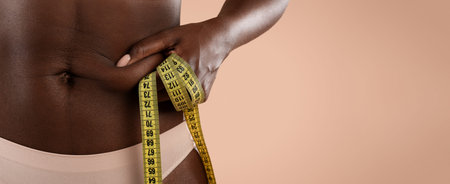 Measuring Body Dimensions With a Tape Measure for Fitness Tracking and Health Insightsの写真素材