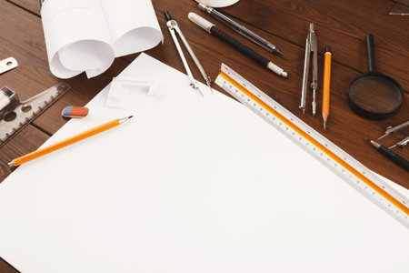 A Collection of Drawing Tools and Supplies is Set on a Wooden Table
