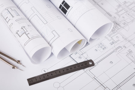 Collection of Architectural Plans and Blueprints Showing Different Designs and Layouts at a Worksite