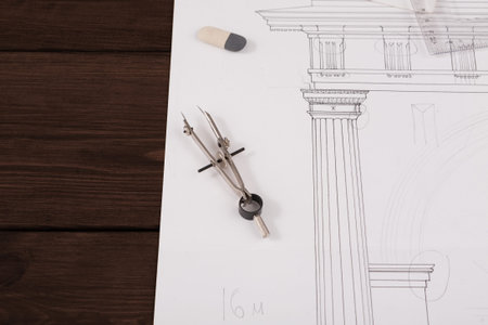 Collection of Tools and Materials for Architectural Drawing on a Desk With Paper Set