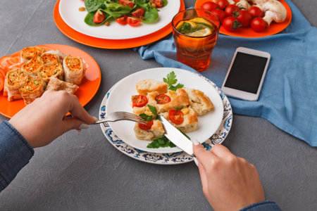 Enjoying a Meal With Various Dishes on a Table at Home During Lunch Time