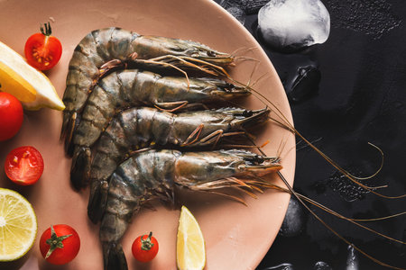 Collection of Fresh Shrimp With Vegetables on a Plate for a Seafood Dishの写真素材