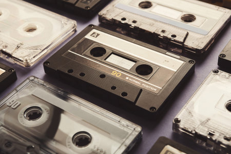Collage of Different Cassette Tapes Arranged in a Flat Set on a Table