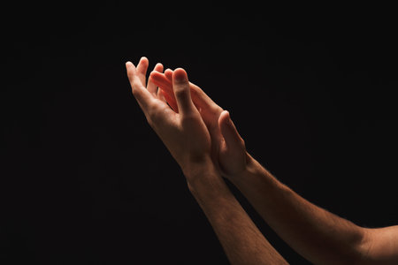 Hands Reach out in a Collage Set Showcasing Human Connection and Emotion in Dark Background
