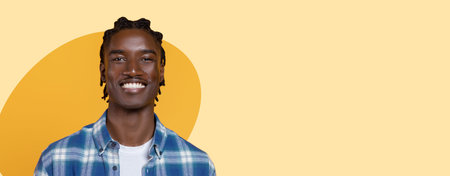 Smiling Man Stands Against Colorful Background in Creative Collage Setting With Bright Colors