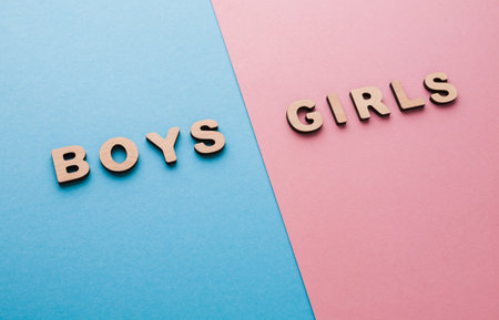 Discussion About Boys and Girls With Wooden Letters on Colored Backgroundの写真素材