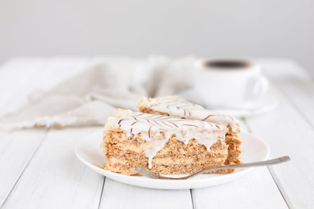 Set of Cake Slices With Coffee on a White Table in a Simple Cafe Setting in the Morning