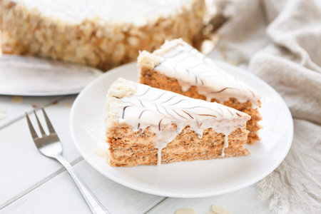 Collection of Cake Slices Served on a White Plate With a Fork Nearby