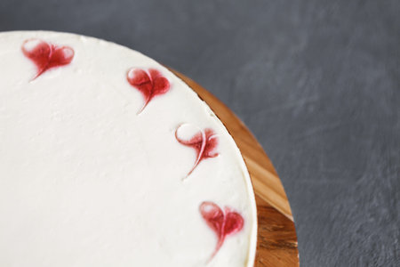 Collage of Dessert Art With Hearts and White Icing on a Wooden Board at a Celebration