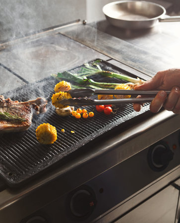 Grilling Food on the Barbecue in a Kitchen Setting During Daytime With Fresh Vegetables