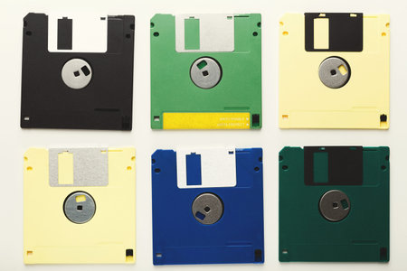 Collection of Vintage Floppy Disks Arranged in a Collage Showcasing Different Colors and Designs