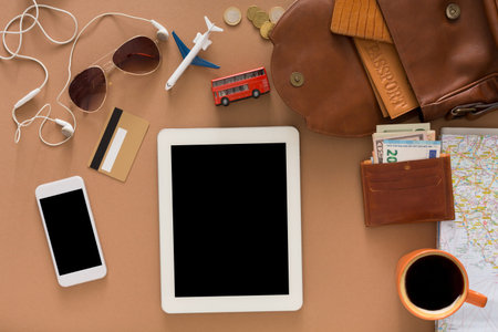 Travel Preparation With Gadgets and Accessories on a Table During the Day