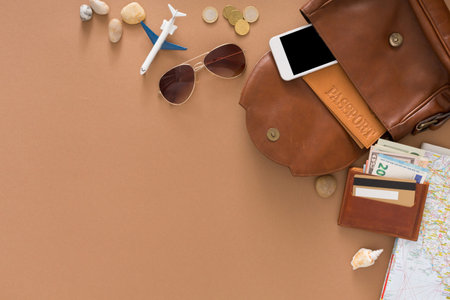 Travel Essentials Are Organized on a Table Ready for a Trip to a Destination in Summerの写真素材