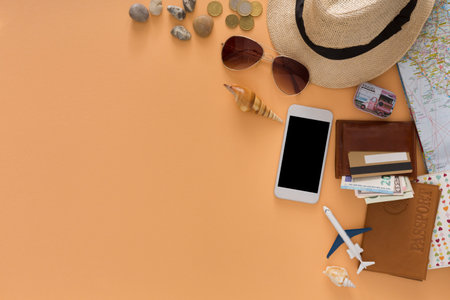 Travel Items and Accessories Arranged on a Table Ready for a Trip or Vacation Planning Session