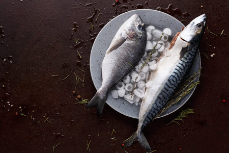 Fresh Fish on a Plate With Ice and Herbs for Cooking or Preparation in a Kitchen Setting