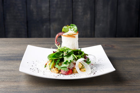 Creative Presentation of Seafood Salad at ICC Change Restaurant in the Eveningの写真素材