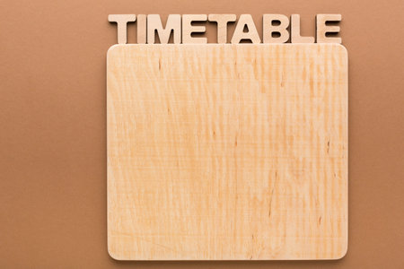 Set out Empty Timetable on a Brown Background for Organization and Planning Activities