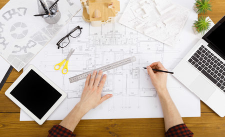Designing Floor Plans With Tools and Technology in an Office Setting During Daytime