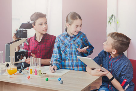 Students Participate in Science Project Activities at a Classroom During the Day