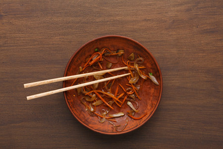 Collection of Empty Bowl With Chopsticks After a Meal With Noodles and Vegetables