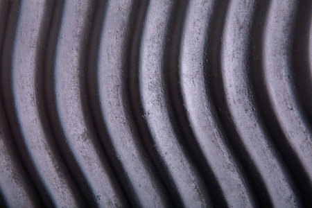 Curved Lines Form a Series of Smooth Patterns in a Collection That Showcases Interesting Textures