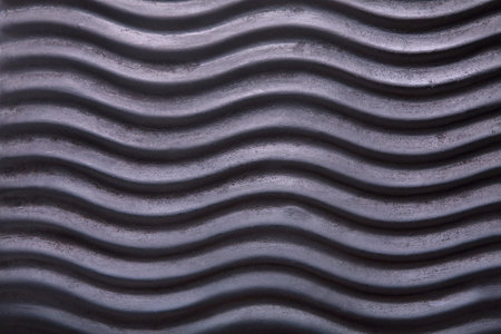 Collage of Wavy Patterns in Dark Tones Showing Texture and Design Elements