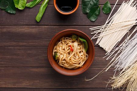 Delicious Noodle Dish With Herbs and Sauce on Wooden Table for a Special Dining Experience