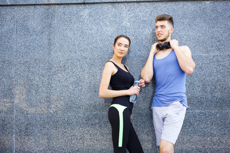 Group of People Having Fun at a Fitness Activity Outdoors in a City Setting During Daytime