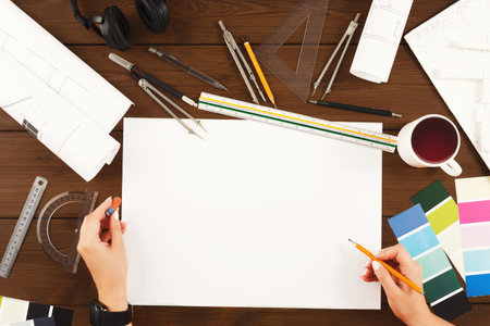 Mosaic of Art Supplies and Tools on a Wooden Table in a Creative Workspace Setting
