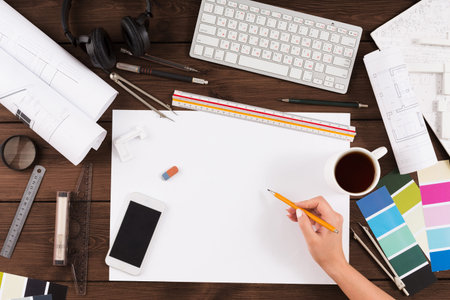 Workspace Collage With Tools and Plans for Design and Creation
