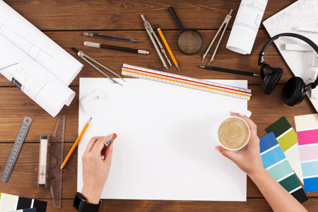 Creative Workspace for Design Projects Featuring Tools and Materials for Planning