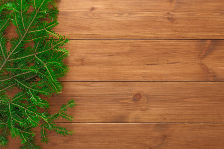 Collection of Green Foliage Arranged on Wooden Surface for Decoration and Craft Projects