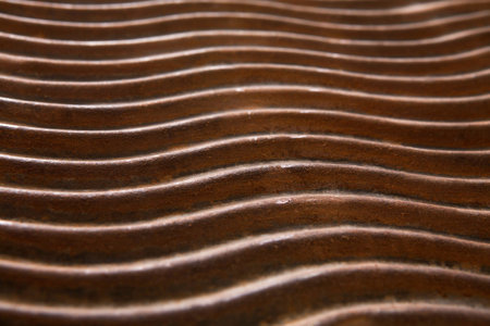 Surface Pattern Showing Wavy Lines on a Textured Material Created for Design Purposes
