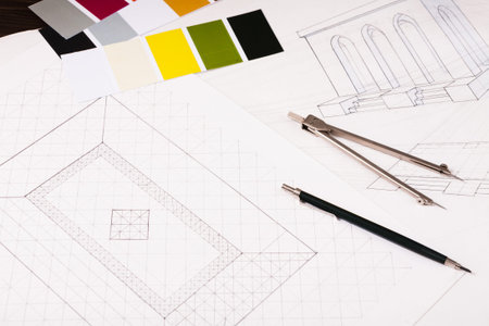 Collection of Design Sketches and Color Swatches for a Building Project in a Workspace
