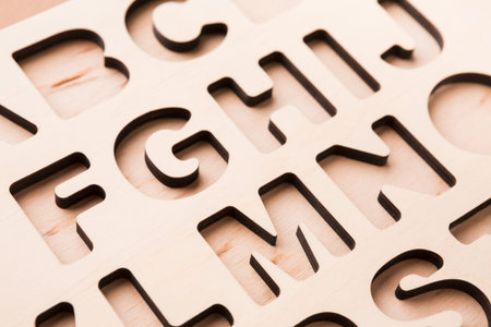 Learning Letters From a Wooden Alphabet Board Designed for Early Education Activities