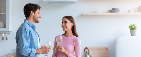 Couple Enjoys Conversation While Holding Drinks in Modern Kitchen Setting During Day
