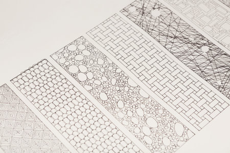 Collection of Black and White Line Art Patterns Arranged in a Unique Collage of Designs