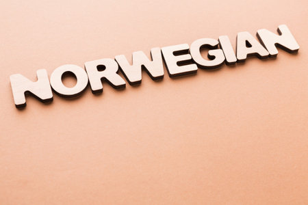 Text Spelling Norwegian Displayed on a Flat Surface in a Simple Arrangement