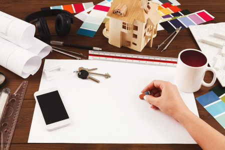 Creative Workspace With Tools and Materials for Design and Planning of Homes and Projects