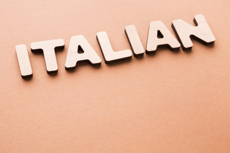 Wooden Letters Spell Italian on a Flat Surface During the Daytimeの写真素材