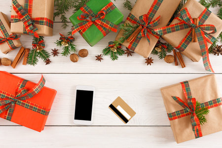 Gift Collection on a Wooden Table With Holiday Decorations