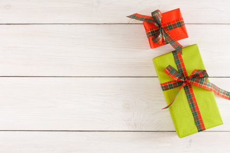 Collection of Gift Boxes Arranged on a Wooden Surface for a Celebration or Festive Occasion