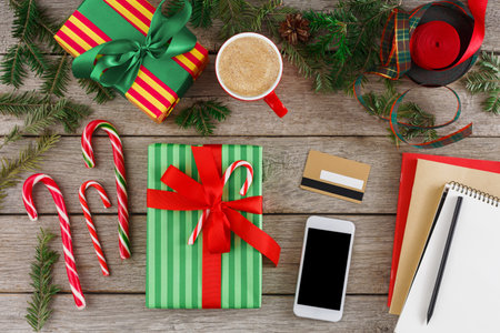 Holiday Gift Collection With Coffee and Decorations on a Wooden Table