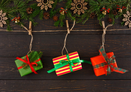 Interesting Collage of Colorful Gifts Hanging on Twine With Decorations for a Festive Occasion