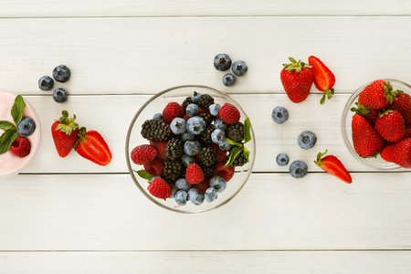 Collection of Fresh Fruits Arranged on White Wooden Table