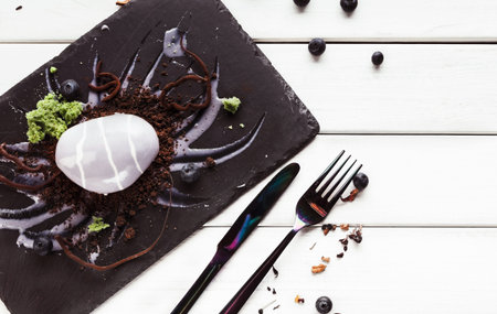 Creative Dessert Presentation With Various Components on a Black Slate Plateの写真素材