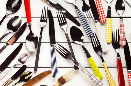 Various Utensils Arranged in a Collage Presenting a Collection of Kitchen Tools and Cutlery