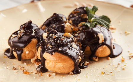 Delicious Dessert Served in a Dish With Chocolate and Nuts at a Dining Table