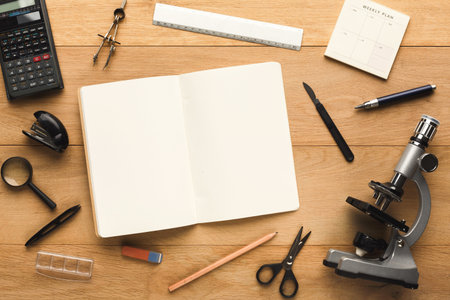 Collection of Study Tools and Materials on a Wooden Table for Educational Purposes